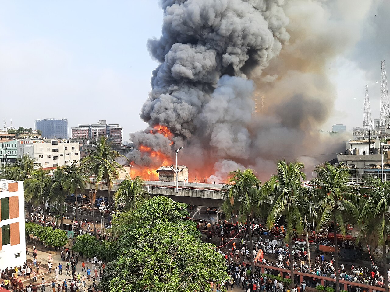 Smoke and flames rise above the Bangabazar market complex during the April 2023 fire.